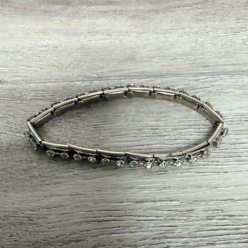 Elegant Silver Tone Bracelet with Clear Stones
